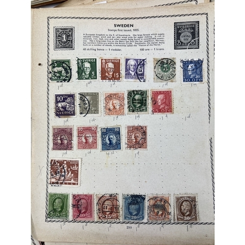 140 - 2 vintage mid century world stamp albums together with a collection of earlier loose album sheets.