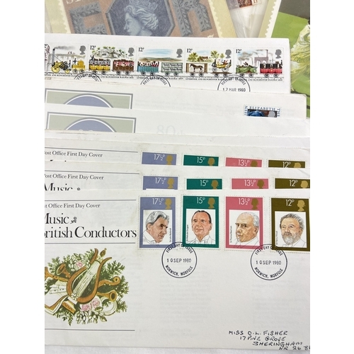 155 - A quantity of assorted vintage first day covers and PHQ cards.