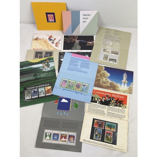 157 - 14 assorted Australia Post mint stamp presentation packs from the 1980's. To include Americas Cup, S... 