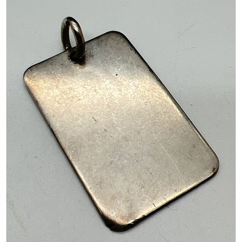 1025 - A large flat ingot style silver Jubilee pendant with hallmarks to front. Hallmarked Birmingham 1977.... 