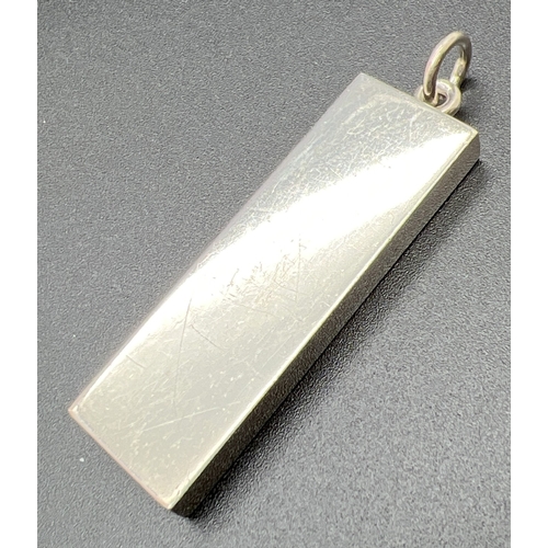 1032 - A vintage silver ingot pendant fully hallmarked to front for Sheffield 1977. Total weight approx. 30... 