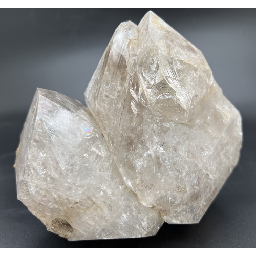 1301 - A large 1.8kg Herkimer diamond cluster with multiple natural rainbow inclusions. Approx. 13.5cm x 15...