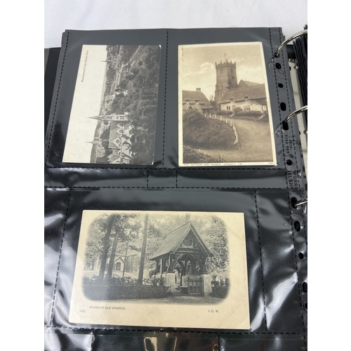 183 - A large binder containing 400 assorted Edwardian and vintage postcards of British Churches, many ear... 