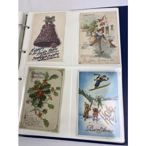 242 - A binder containing approx. 120 assorted Edwardian and vintage greetings cards. In clear plastic dis... 