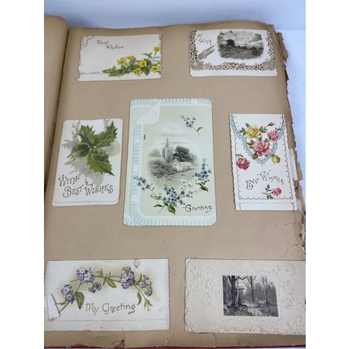 269 - 2 large late Victorian scrap albums containing mostly greetings cards of the era.