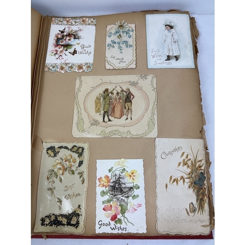 269 - 2 large late Victorian scrap albums containing mostly greetings cards of the era.