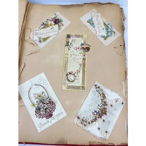 269 - 2 large late Victorian scrap albums containing mostly greetings cards of the era.