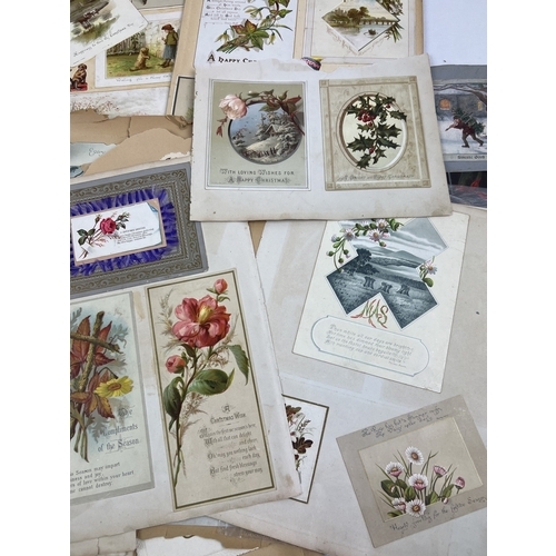 281 - A collection of Victorian scrap book loose pages featuring greetings cards.