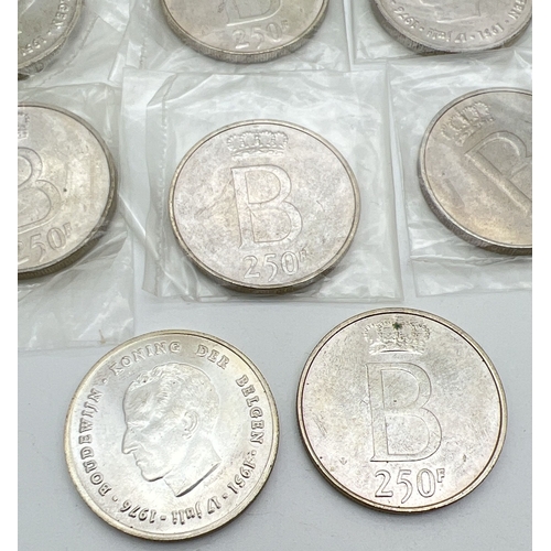 90 - 11 vintage Belgium silver 250 Franc Baudouin 25th Anniversary of Accession coins. In small box with ... 