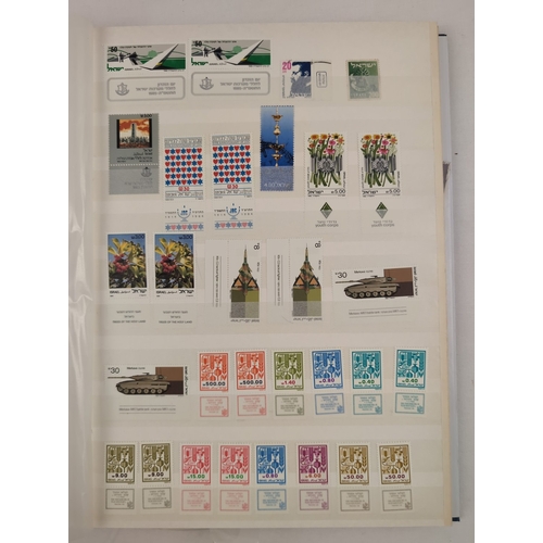 118 - 2 vintage stamp stock books containing a collection of stamps from around the world. Blue album cont... 