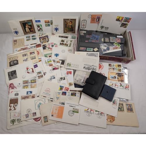 124 - A collection of vintage first days covers, stamp stock books sheets and collectors album plastic sle... 