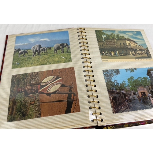 189 - 2 vintage albums containing a collection of coloured vintage postcards from various destinations. To... 