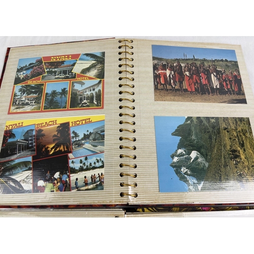 189 - 2 vintage albums containing a collection of coloured vintage postcards from various destinations. To... 