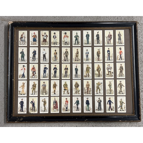 218 - A framed and glazed set of 50 military uniform John Players cigarette cards. Frame size approx. 43 x... 