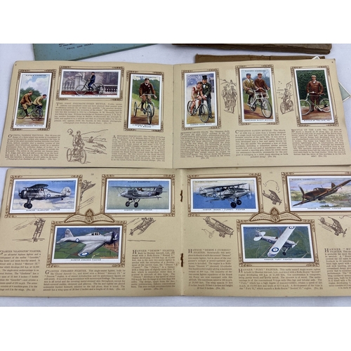 265 - A collection of assorted vintage cigarette cards and albums, to include Wills, John Players, Carrera... 