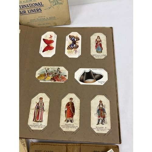 265 - A collection of assorted vintage cigarette cards and albums, to include Wills, John Players, Carrera... 