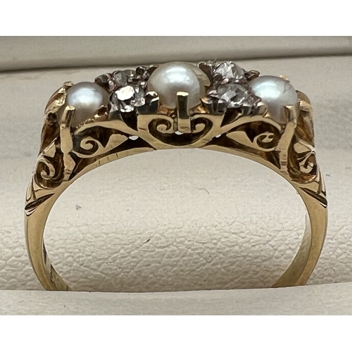 1007 - A vintage Edwardian style 18ct gold, pearl and diamond eternity style ring.  Alternating pearls and ... 