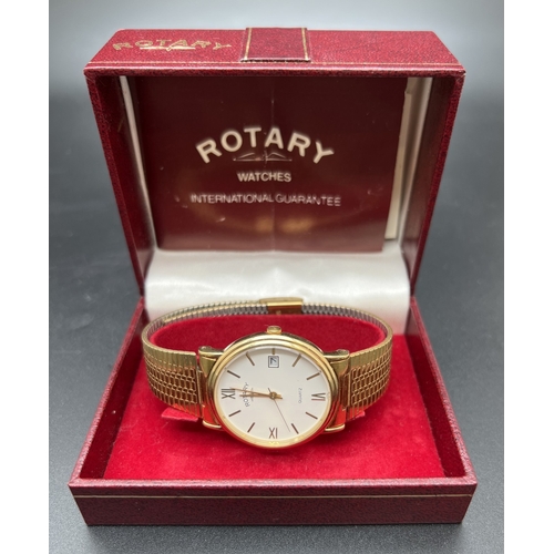 1110 - A boxed men's gold tone stainless steel strap wristwatch by Rotary 4087. Gold tone case with white f... 