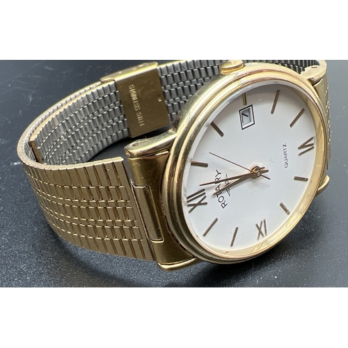 1110 - A boxed men's gold tone stainless steel strap wristwatch by Rotary 4087. Gold tone case with white f... 