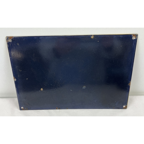 1148 - A small rectangular shaped enamel advertising wall sign for Michelin tyres. Approx. 20cm x 30cm.