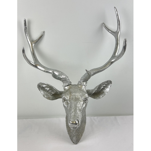 1345 - A large modern resin, wall mountable stags head in glittered silver finish. Approx. 60cm tall.