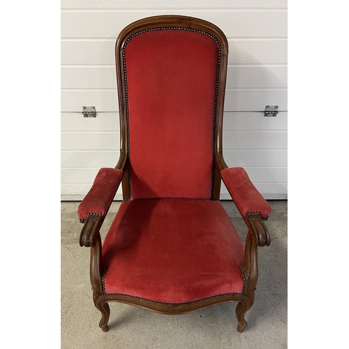 1367 - A large antique curved high backed low armchair with red corduroy velvet upholstery. Cabriole style ... 