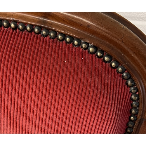 1367 - A large antique curved high backed low armchair with red corduroy velvet upholstery. Cabriole style ... 