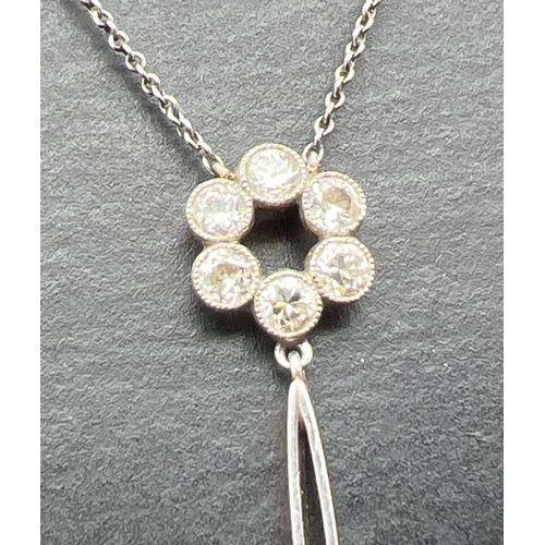 2 - An Art Deco 15ct gold and platinum, aquamarine and diamond pendant necklace. A fine belcher chain fi... 