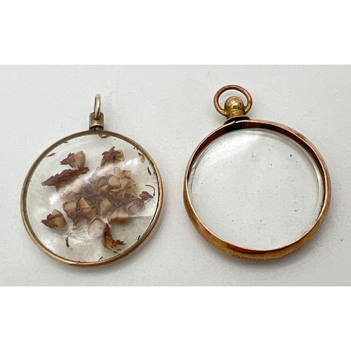 31 - 2 glass display pendants with 9ct gold mounts, one with dried flowers. Both hallmarked and measure a... 