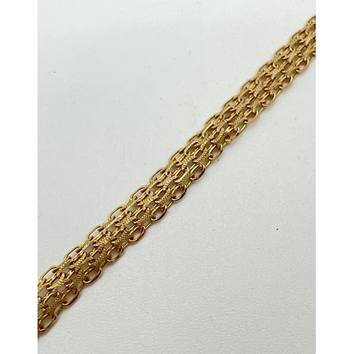 54 - A 7 inch 9ct gold belcher chain and decorative flat link bracelet with lobster claw clasp. Gold mark... 