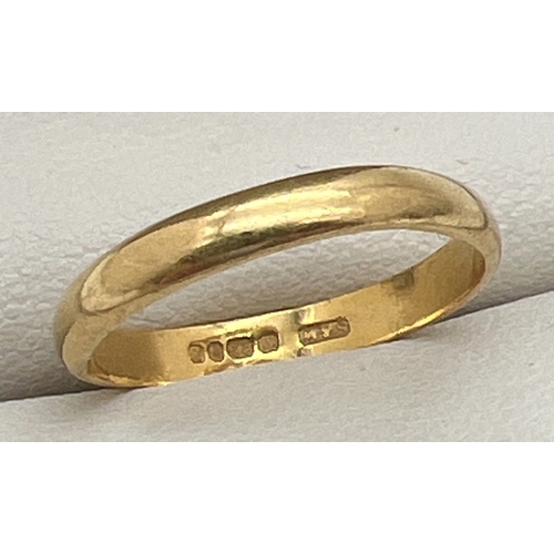 55 - A vintage 22ct gold band ring, size M. Slightly misshapen. Total weight approx. 2.2g.