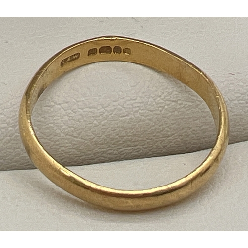 55 - A vintage 22ct gold band ring, size M. Slightly misshapen. Total weight approx. 2.2g.