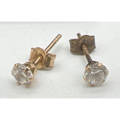 56 - 3 pairs of 9ct gold earrings in both drop and stud styles. A pair of screw back faux pearl studs, a ... 