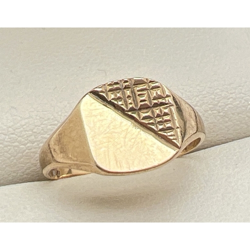 59 - A vintage 9ct gold square shaped signet ring with half and half criss cross design and empty cartouc... 