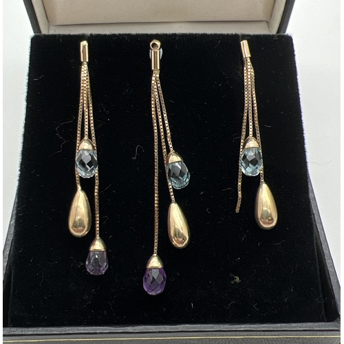 61 - A 9ct gold triple drop design pendant and matching earrings, set with blue topaz and amethyst. 3 box... 