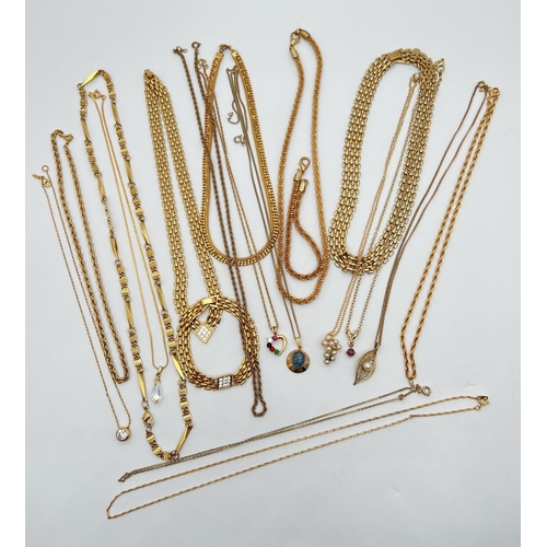 75 - A collection of gold tone vintage jewellery necklaces, some with matching bracelets. To include a fi... 