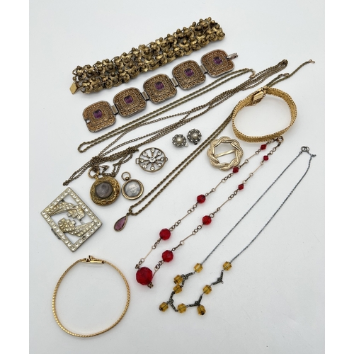 84 - A small collection of antique and vintage gold tone jewellery. To include a mourning locket containi... 