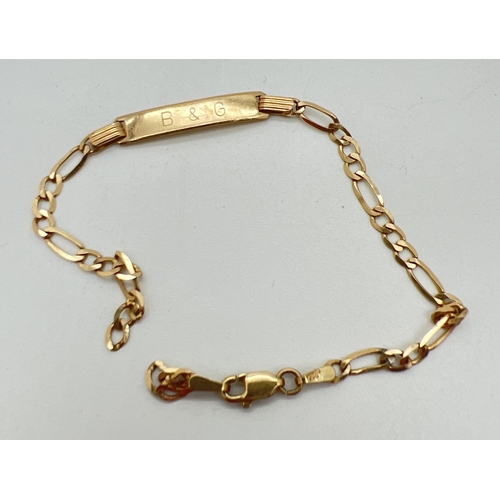 89 - A 9ct gold identity bracelet for scrap or repair. One side engraved B & G, the other XVI. Gold marks... 