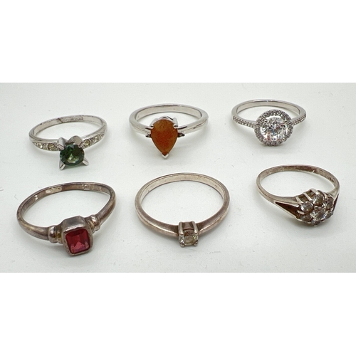 92 - 6 modern and vintage design silver stone set rings. To include a halo setting with clear stone, a ga... 