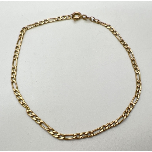 107 - A 7 inch 9ct gold Figaro chain bracelet with spring  ring clasp. Gold marks to fixings. Total weight... 