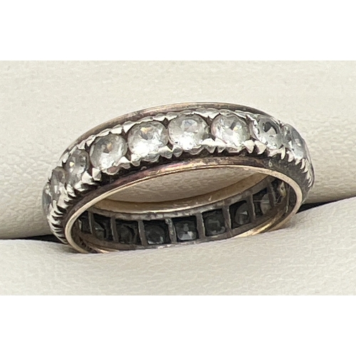 118 - A vintage 9ct gold and silver full eternity ring set with round cut clear stones. Wear to all stones... 