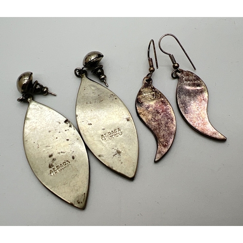 124 - 2 pairs of Mexican silver drop earrings both set with abalone shell and onyx. Largest pair approx. 6... 