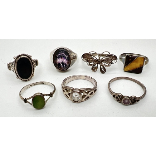 125 - 7 silver and white metal rings, mostly stone set. To include onyx oval ring, blue john oval signet r... 