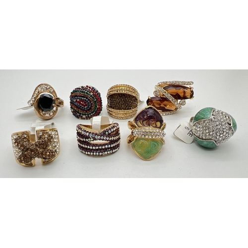 136 - 7 costume jewellery statement cocktail rings in various colours and designs, set with Swarovski crys... 