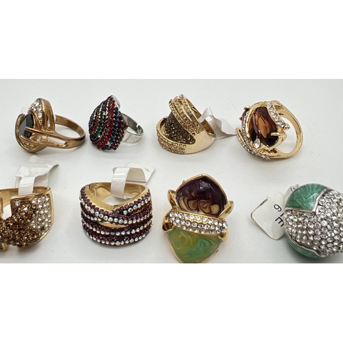 136 - 7 costume jewellery statement cocktail rings in various colours and designs, set with Swarovski crys... 