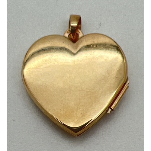 145 - A 9ct gold heart shaped locket with embossed scroll  & foliate design to front. Gold marks on fixed ... 