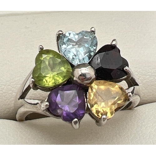 168 - A silver and multi gemstone flower design dress ring. Set with heart shaped cut citrine, amethyst, p... 