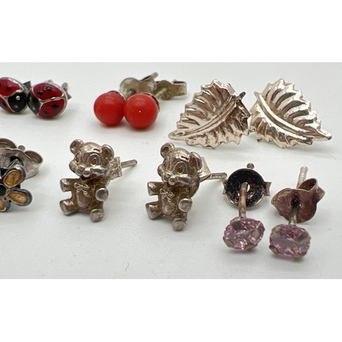 170 - 10 pairs of silver and white metal stud style earrings, many stone set. To include teddy bears, enam... 