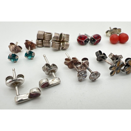 170 - 10 pairs of silver and white metal stud style earrings, many stone set. To include teddy bears, enam... 