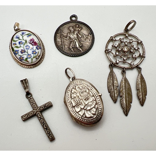 178 - 5 silver and white metal pendants. An oval shaped locket with floral decoration, a floral ceramic pa... 